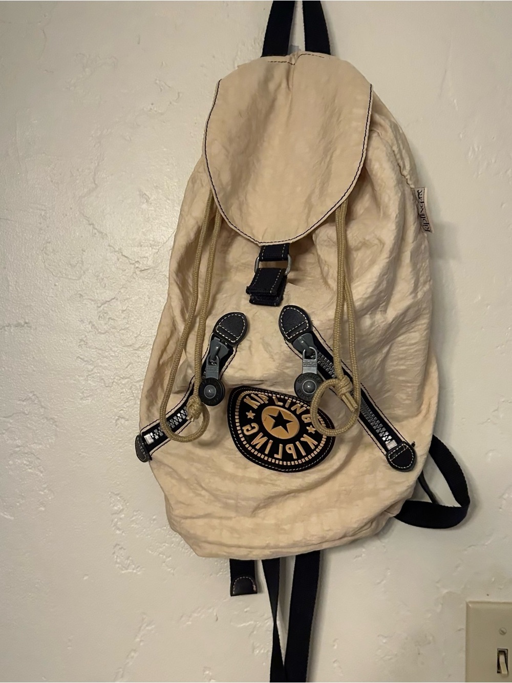 Kipling Beige Canvas Drawstring Backpack with Black Trim